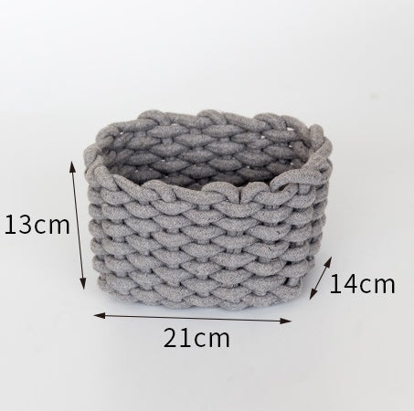 Woven cotton storage basket shown in a living room