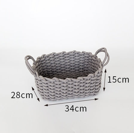Cotton storage basket shown with its handles